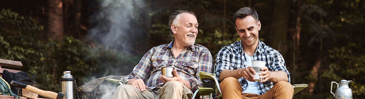 Two men camping in a forest