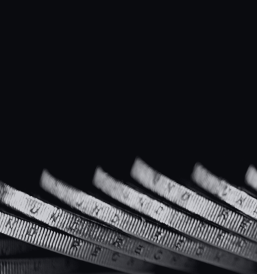 coins on a black background