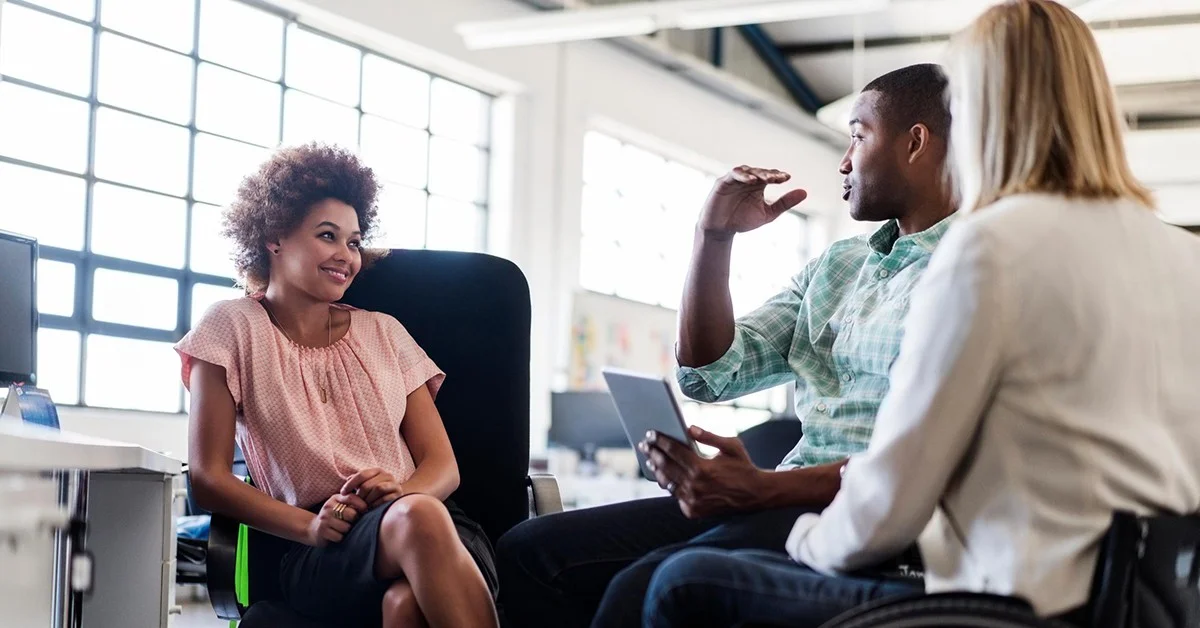 Image of people involved in discussion with financial advisor