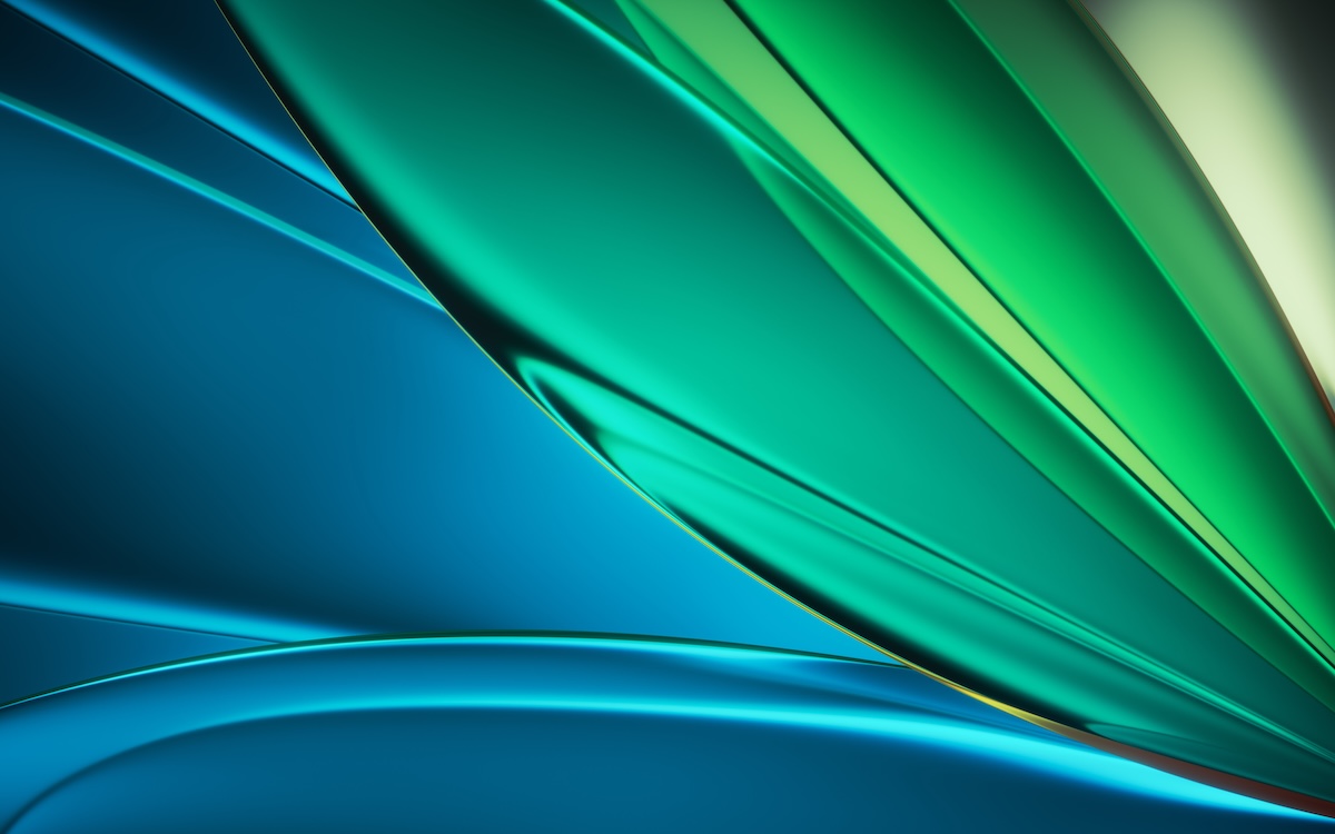 Upward view of modern skyscrapers and the CN Tower against a colorful sunset sky with soft pink and blue clouds.