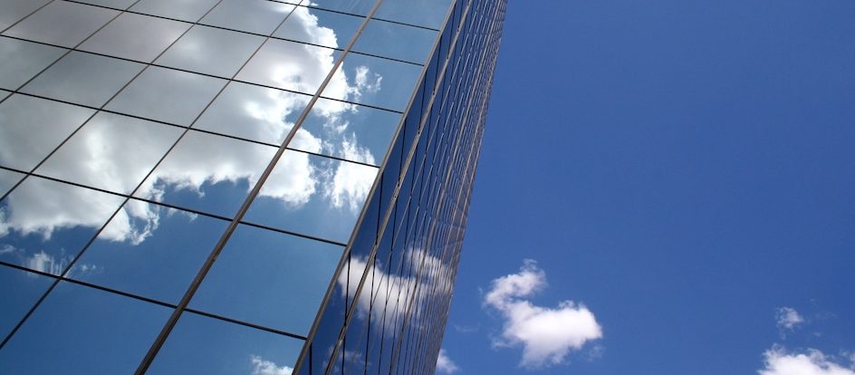Clouds reflected in building windows