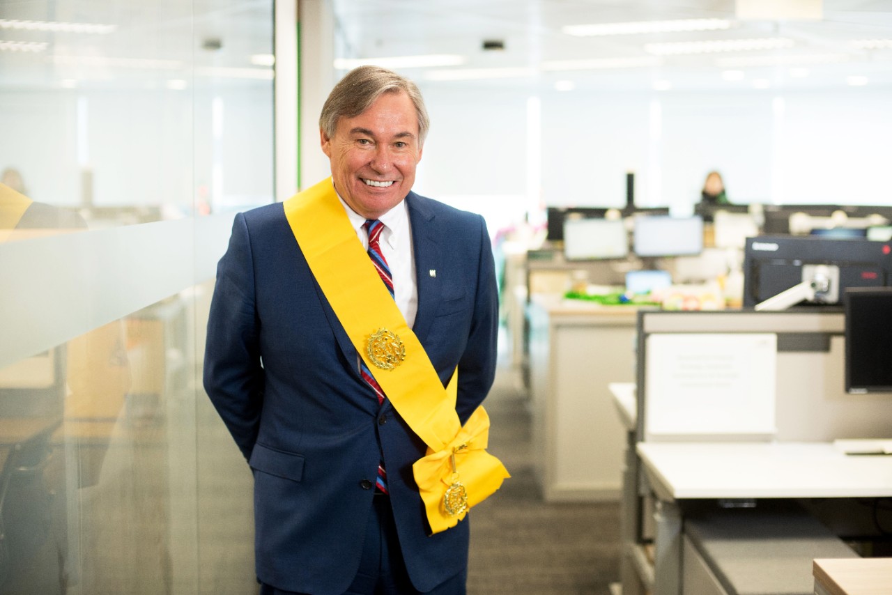 Robert Elliott, Chairman of Manulife Cambodia, has been awarded the highly prestigious Royal Order of Monisaraphon by the King of Cambodia wearing a yellow sash