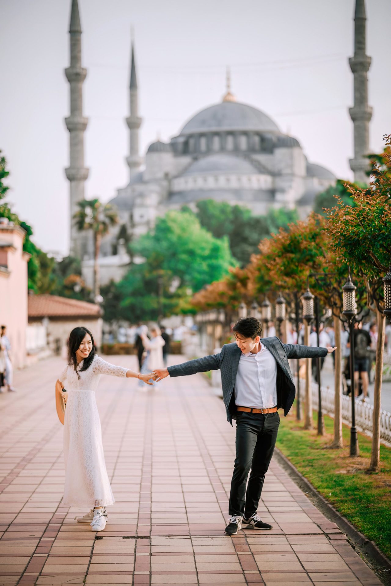 Couple standing in front of Blue Mosque, Istanbul