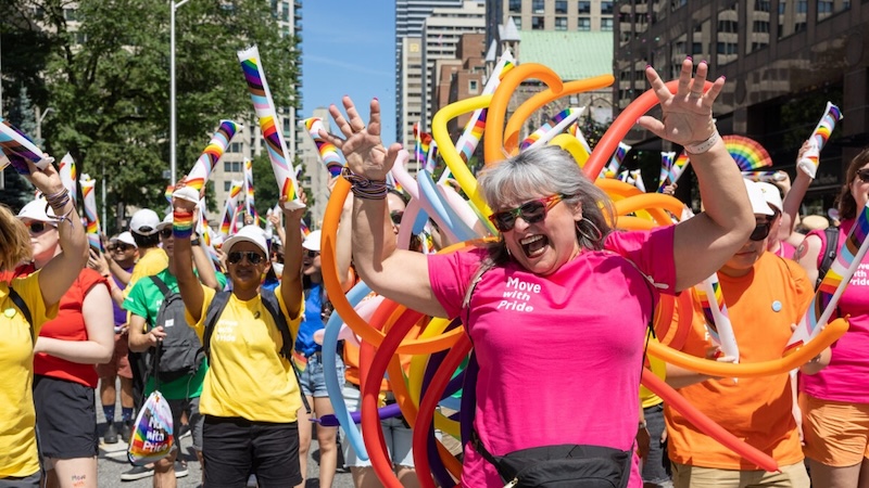 People in colourful shirt at a parade